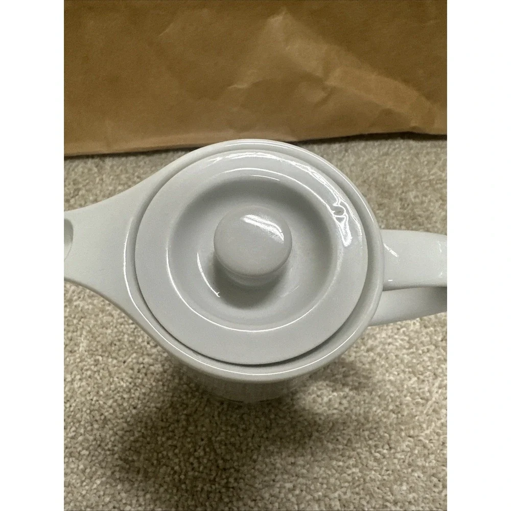 Vintage cream pitcher in the retro floral, manufactured by Suisse Langenthal